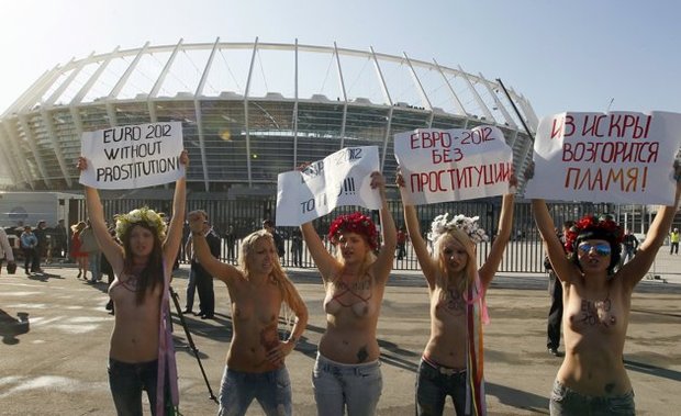 Femen activists protest against prostitution while european soccer championship in the ukraine; Babe Funny 